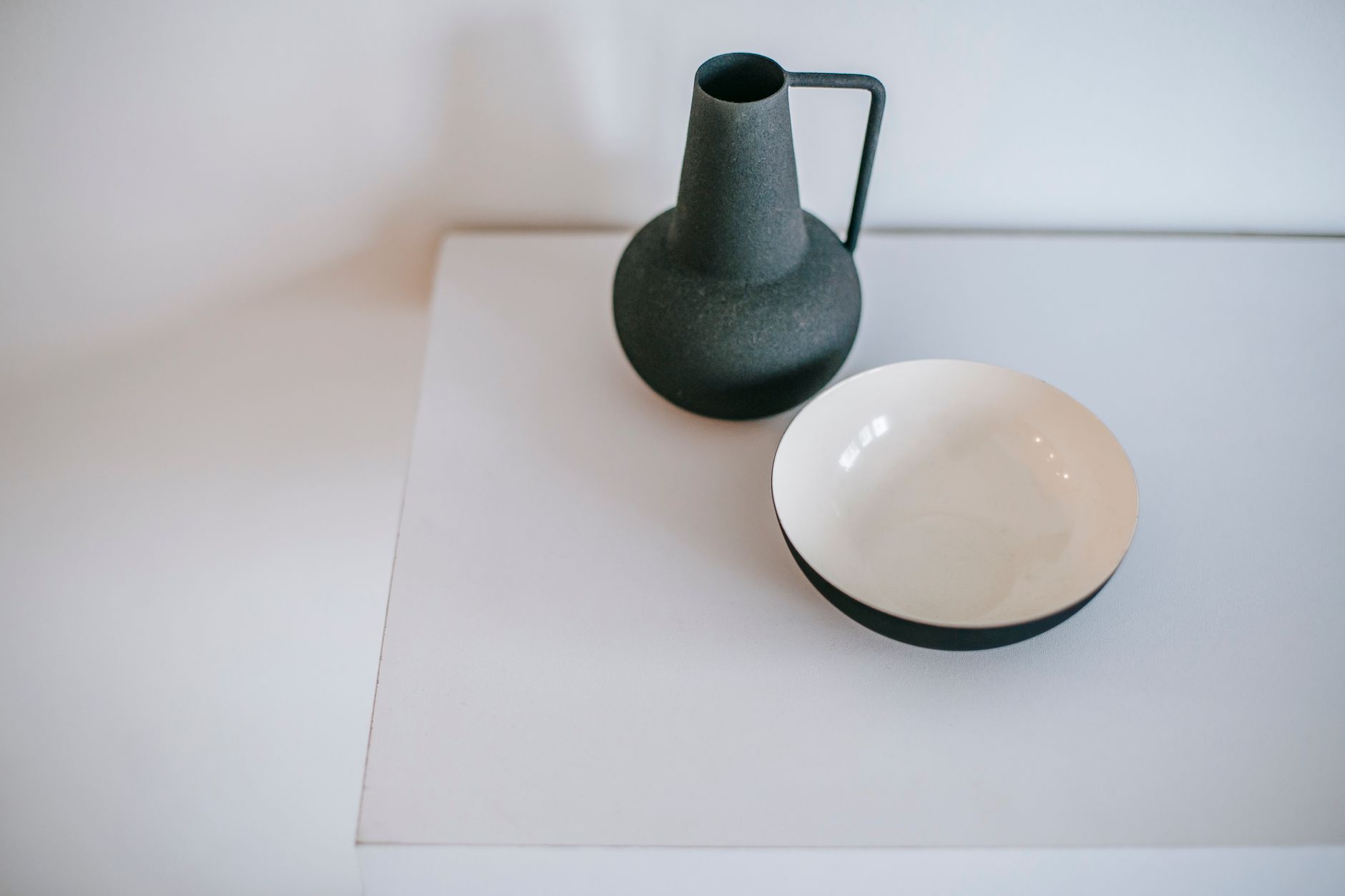 Bright studio space with clay wheels and work stations